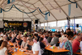 Crowds enjoying Oktoberfest at the harbour in Puerto de la Cruz