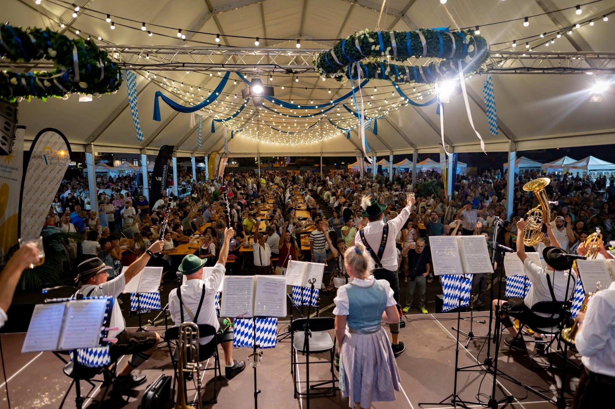 Live Bavarian music and festival crowds at Puerto de la Cruz Oktoberfest