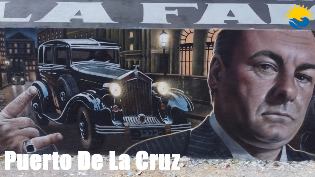 PuertoDeLaCruz.info video thumbnail showing a vintage car and portrait mural from the October 2025 update