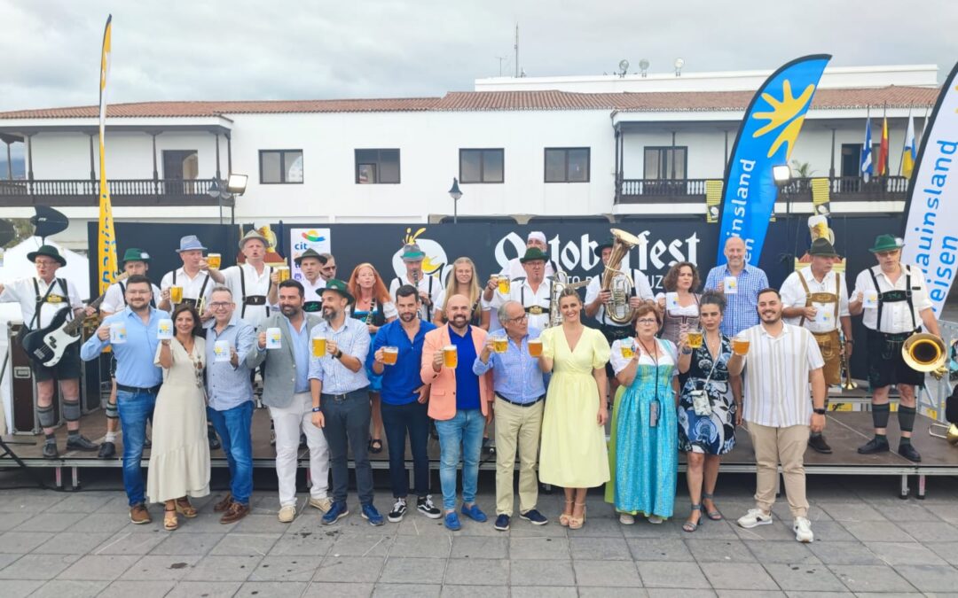 Musicians and event representatives at Puerto de la Cruz Oktoberfest in 2022