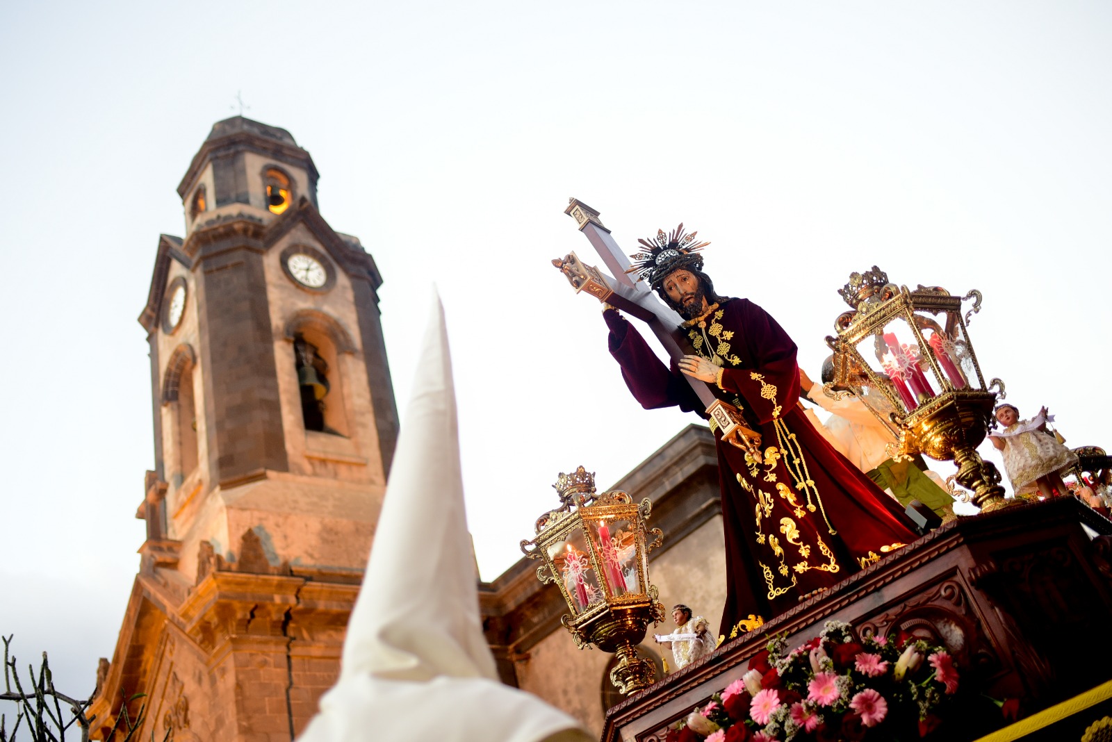 Nazareno procession with church tower behind in Puerto de la Cruz