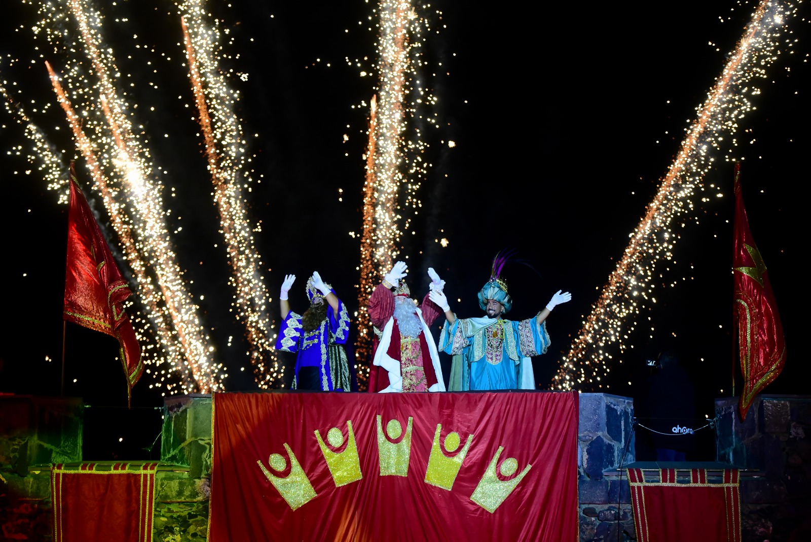 Three Kings on a decorated float with sparkling stage effects in Puerto de la Cruz