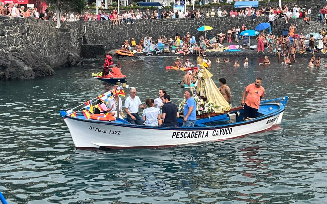 Smaller Virgen del Carmen Chiquita image aboard a fishing boat at Puerto de la Cruz harbour in July 2026